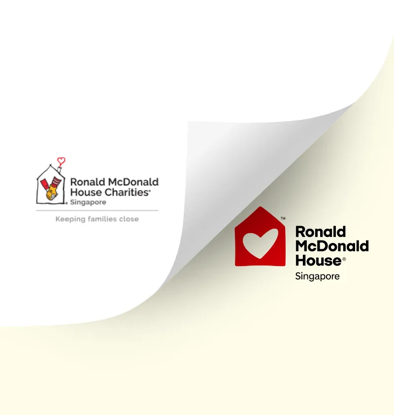 The old Ronald McDonald House Charities Singapore logo peeling back to reveal the new Ronald McDonald House Singapore logo.